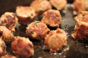 Browning Meatballs in Cast Iron Pan
