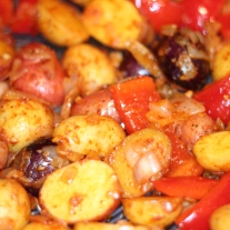 Mini Potatoes, Red Peppers and Onions in Circulon® Roaster